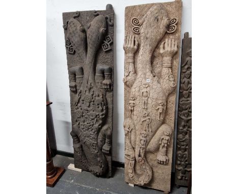 Two large impressive, Timorian (Indonesia) chieftains hut doors. each with deep carved lizard decoration one with figures upo