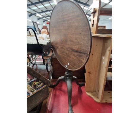 A georgian mahogany tilt top tripod table.