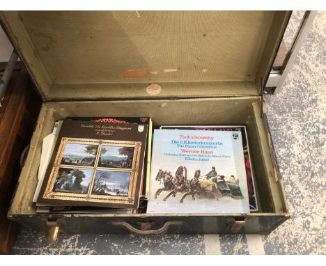 A travel trunk containing classical LP records