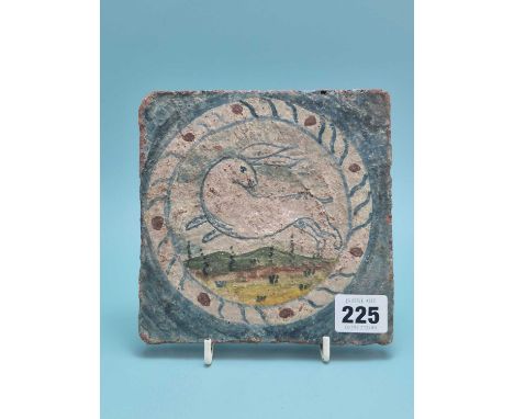 An unusual antique hand-decorated glazed pottery tile. 15.5 x 15 cm