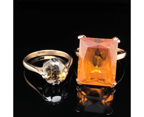 A large gem set cocktail type orange gem set ring, unhallmarked, assessed as 14ct gold, ring size R 1/2, and a further vintag