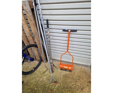 A selection of Wilkinson sword gardening tools and a lawn aerator 