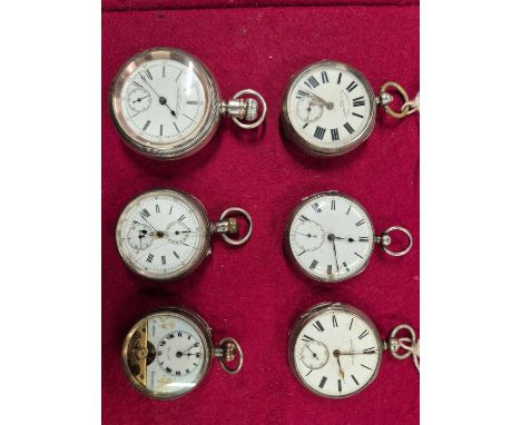 An antique Waltham watch company coin silver pocket watch and five other silver-cased pocket watches.