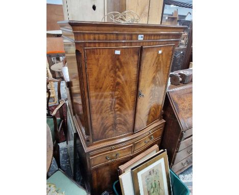 A vintage Georgian mahogany style small tall boy drinks cabinet. W 72 x d 46 x h 153 cm.