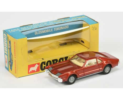 Corgi Toys 276 Oldsmobile Toronado - Metallic brown, cream interior, grey plastic tow hook and "Golden Jacks" Take-off wheels