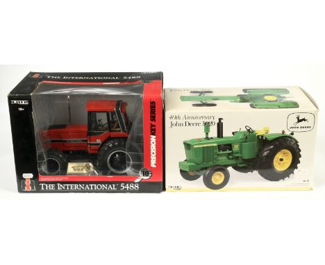 Ertl (1/16th) a pair (1) 14757 The International Tractor 5488 - Red, black and Silver- Mint in a Good Plus window box and (2)