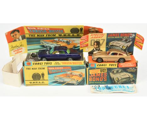 Corgi Toys A pair - (1) 261 "James Bond" Aston Martin Taken From The Film "Goldfinger" - Gold body, red interior, wire wheels