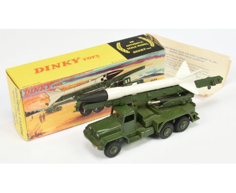Dinky Toys Military 667 Honest John Missile Launcher - Green including plastic hubs with white and black missile - Excellent 