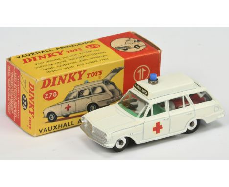 Dinky Toys 278 Vauxhall Estate "Ambulance" - White body, green interior with figure and patient on stretcher, silver trim, so