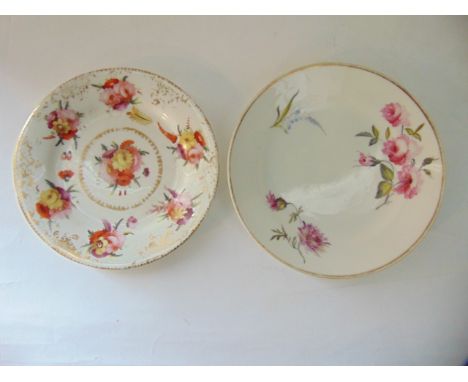 An early 19th century Swansea dessert plate with painted rose and other floral sprays and with impressed Swansea and trident 