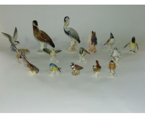 A collection of continental ceramic models of birds mainly by Karl-Ens including a snipe 22cm in height, with printed and imp