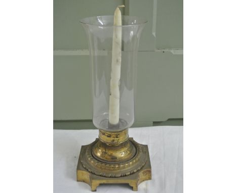 A good quality 19th century candle lamp with tall cylindrical and flared glass shade, raised on a cast ormulo base with ring 