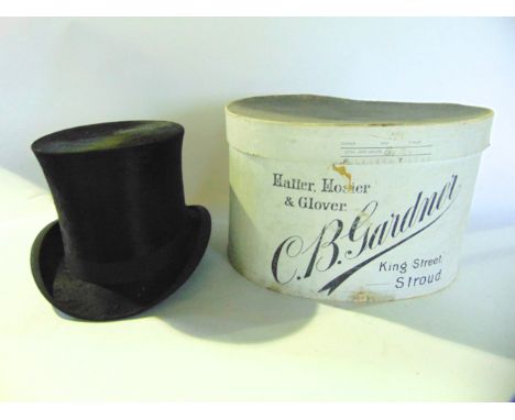 A gentleman's antique black felt top hat, marked to interior C B Gardner Hatter, Stroud together with a oversized painted par