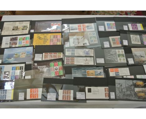 A quantity of better value unmounted mint GB stamps in mini sheets, booklets, booklet panes on cards and hanger sheets includ