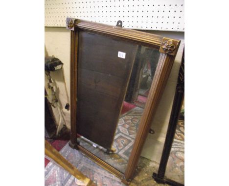 A 19th century pier glass with reeded architectural column surround and applied flower head detail, 87 cm x 50 cm approx
