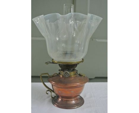 A good quality Benson Style chamber lamp principally in copper with brass partially scrolled handles and fittings with Hinks 
