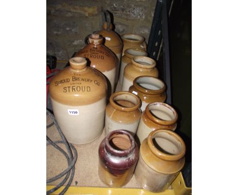 A collection of 19th century and later salt glazed jars and flagon's, two flagon's labelled Stroud Brewery Company, Stroud to