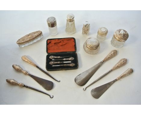 A miscellaneous collection of silver-mounted dressing table items, various makers, Birmingham, London & Chester, 1890 - 1923,