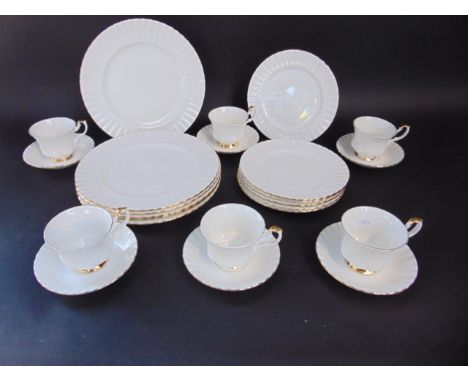 A collection of Royal Albert Val D'or dinner and tea wares with white glaze comprising six cups, six saucers, six dessert pla