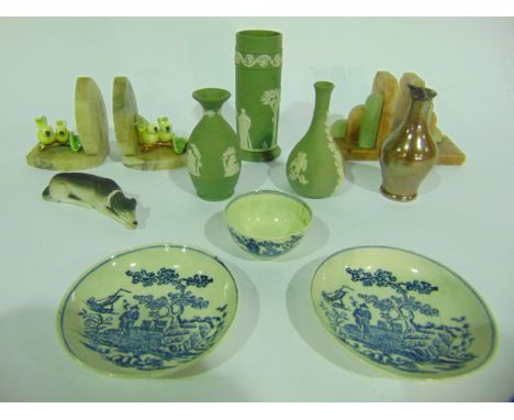 A small collection of ceramics including a recumbent model of a greyhound, three pieces of Wedgwood green ground jasper wares