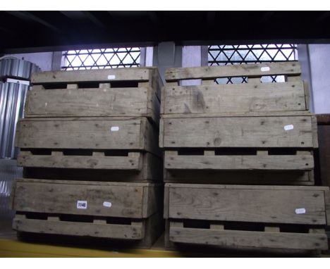A set of eleven vintage market crates in timber with nailed finish
