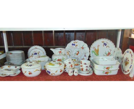 An extensive collection of Royal Worcester Evesham pattern oven to table wares comprising a large jug, height 24cm, a six sec