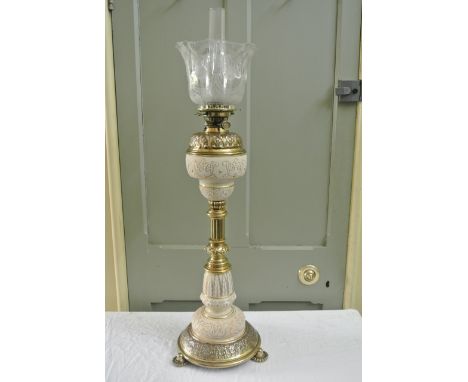 A Victorian polished brass and ceramic banqueting oil lamp by Hinks and son with Hinks lever no2 burner, crimped etched glass