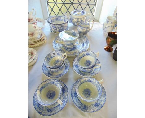 A collection of 19th century blue and white printed ceramics in the Swiss Cottage pattern comprising six cups, five saucers, 