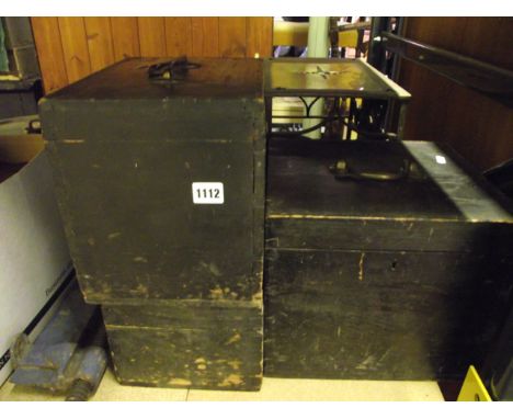 Three small vintage stained wooden boxes with hinged lids and brass carrying handles, a large sheet brass and iron trivet, a 