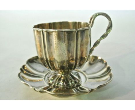 A French silver cup and saucer, Francois Diosne, Paris, 1842 - 1859, 925 standard, the fluted bowl on a spreading foot, attac