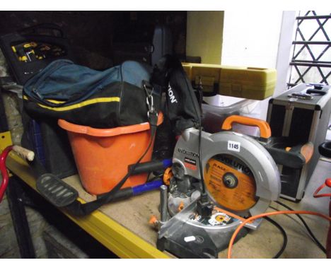 A comprehensive collection of workshop tools including an Evolution chop saw, a 900 watt Biscuit jointer, pipe bender, useful