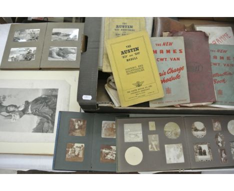 A collection of vintage family photograph albums and ephemera together with a number of vehicle maintenance books from the 19