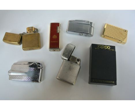 7 vintage cigarette lighters including Ronsons and Dunhill examples