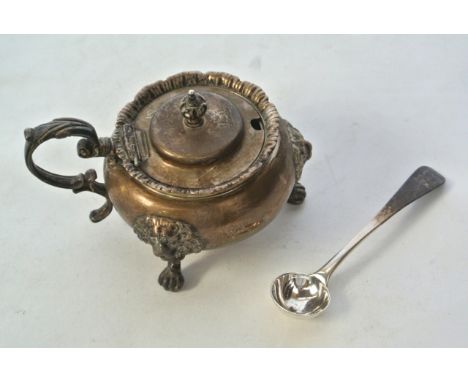 A Victorian silver mustard pot, John Evans II, London, 1855, of plain bulbous form, on three paw feet with lion head joints, 