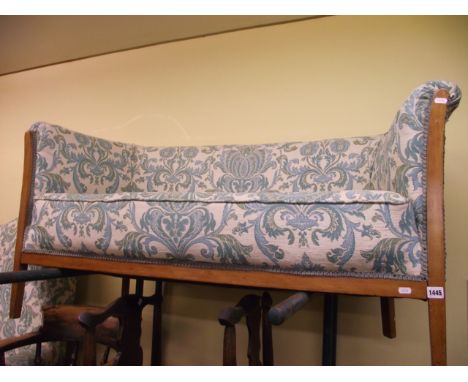 An Edwardian two seat sofa with later upholstered finish, the show wood frame with inlaid detail