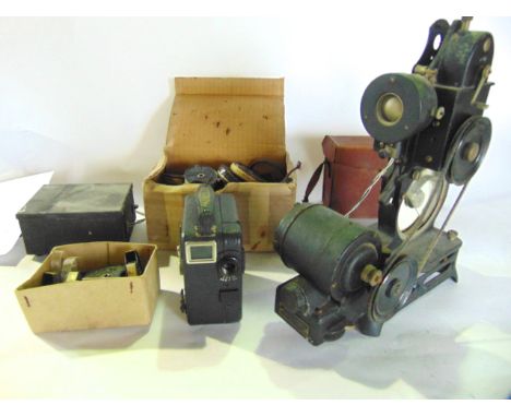 A Pathescope projector together with a cased Pathescope recorder, various accessories, Pathescope film reel of varying subjec