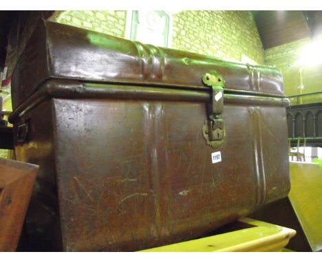 A Victorian tin travelling trunk with original wood grained finish brass lock plate and clasp.