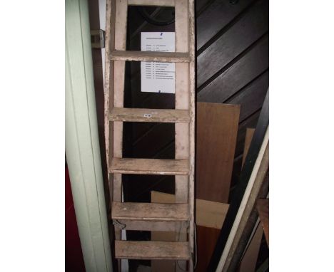 A vintage pine tradesman's folding step ladder R F Ridd & Sons Ltd, together with a tin trunk containing an assortment of loc