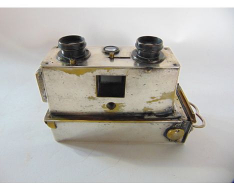 An early 20th century stereoscopic plate camera with silver plated body, marked verso Verascope Bt S C D G, RF Paris, numbere