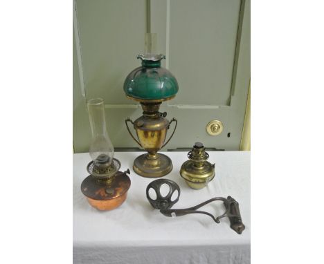 A vintage brass trophy shaped oil lamp with stepped and domed circular base together with a Veritas copper drop font and a Ar