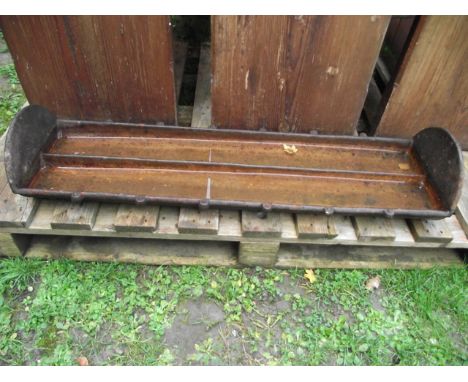 A vintage cast iron pig feeding trough of rectangular form with two channels, 107 cm long approx