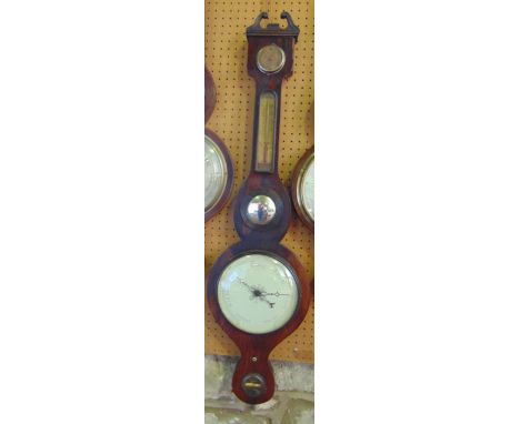 A mid 19th century rosewood veneered wheel barometer, with painted dial.