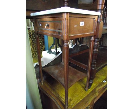 An early 20th century French side table fitted with a single frieze drawer beneath a marble top raised on fluted supports wit