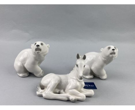 RUSSIAN CERAMIC FIGURE OF A UNICORN, marked 'Made in USSR' to underside, 11cm high, along with a pair of polar bear figures a