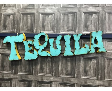 TEQUILA - A MEXICAN INDUSTRIAL ART PUB SIGN, painted in green and yellow, in tin with steel support, 120cm wide