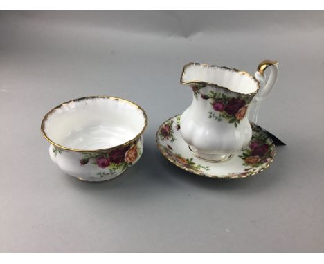 ROYAL ALBERT OLD COUNTRY ROSES TEA SERVICE, comprising six cups, six saucers, six side plates, sugar and cream