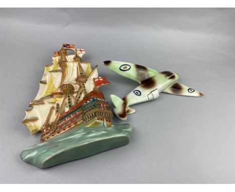 CERAMIC WALL PLAQUE IN THE FROM OF A SPITFIRE, 38cm wide, along with three other ceramic wall hangings (4)