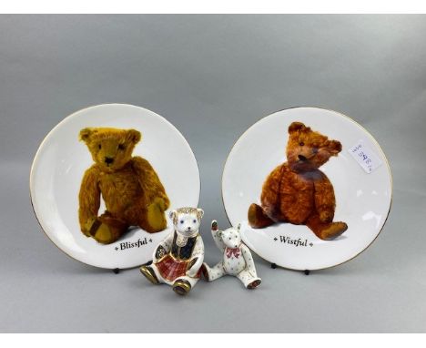 ROYAL CROWN DERBY 'SHONA BEAR', 8cm high, along with a smaller Royal Crown Derby bear and two Royal Worcester plates of 'Blis