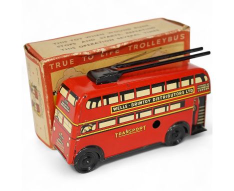 A boxed Wells Brimtoy tinplate clockwork trolley bus loosely in London Transport livery, together with three keys. Condition 