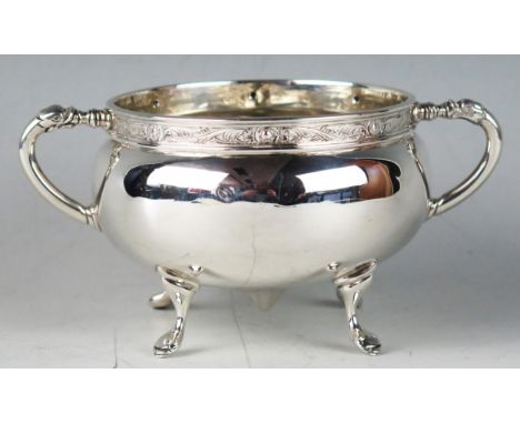 A George V silver sugar basin, of circular form, maker Fattorini &amp; Sons Ltd, Sheffield, 1926, with handles in the form of